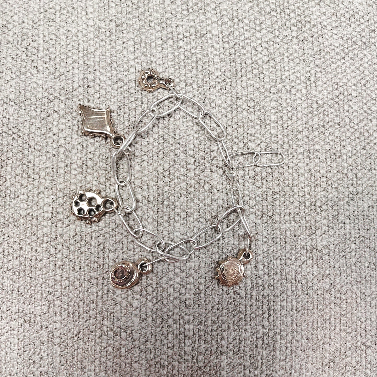 Brass and silver charm bracelet