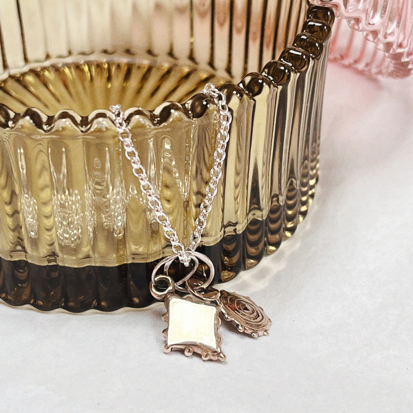 Brass and silver charm necklace