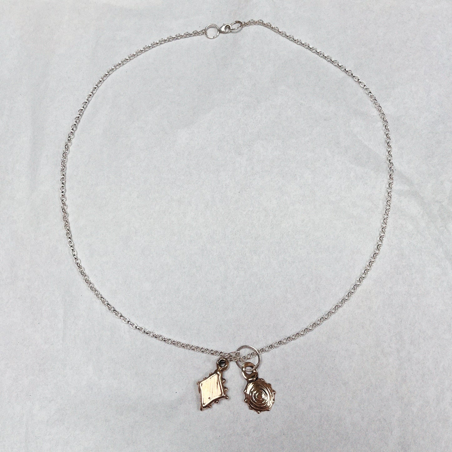 Brass and silver charm necklace