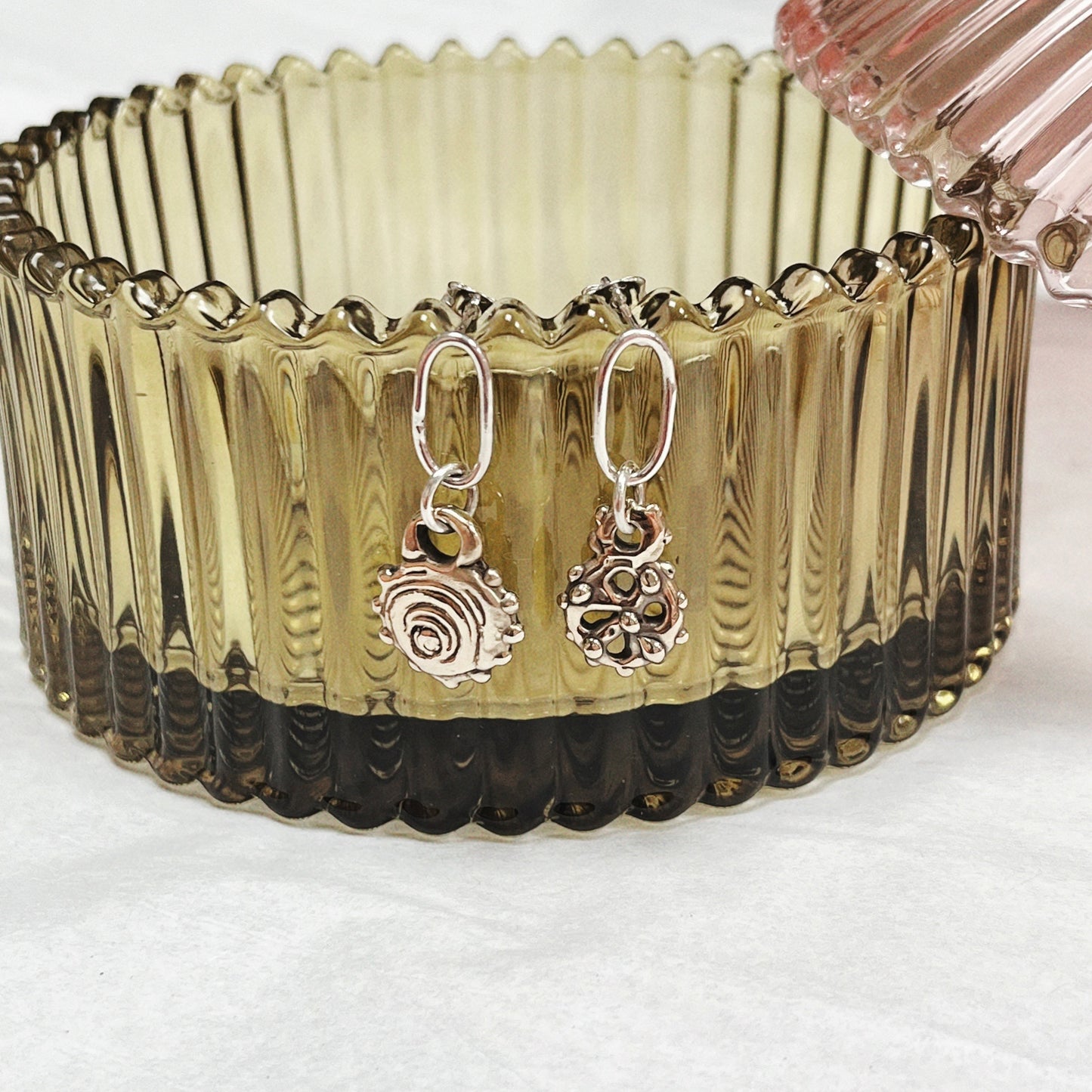 Brass and silver charm studs