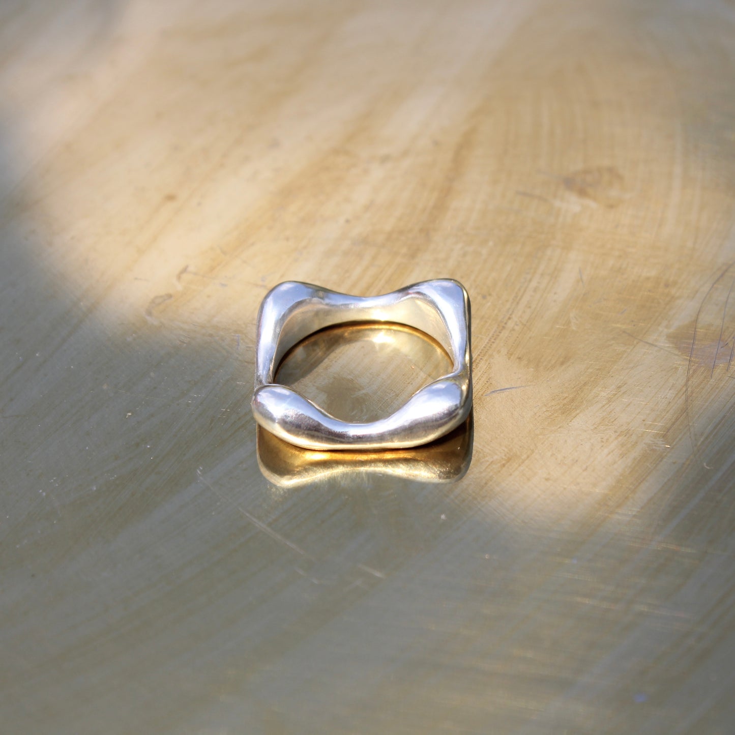 Domed square ring